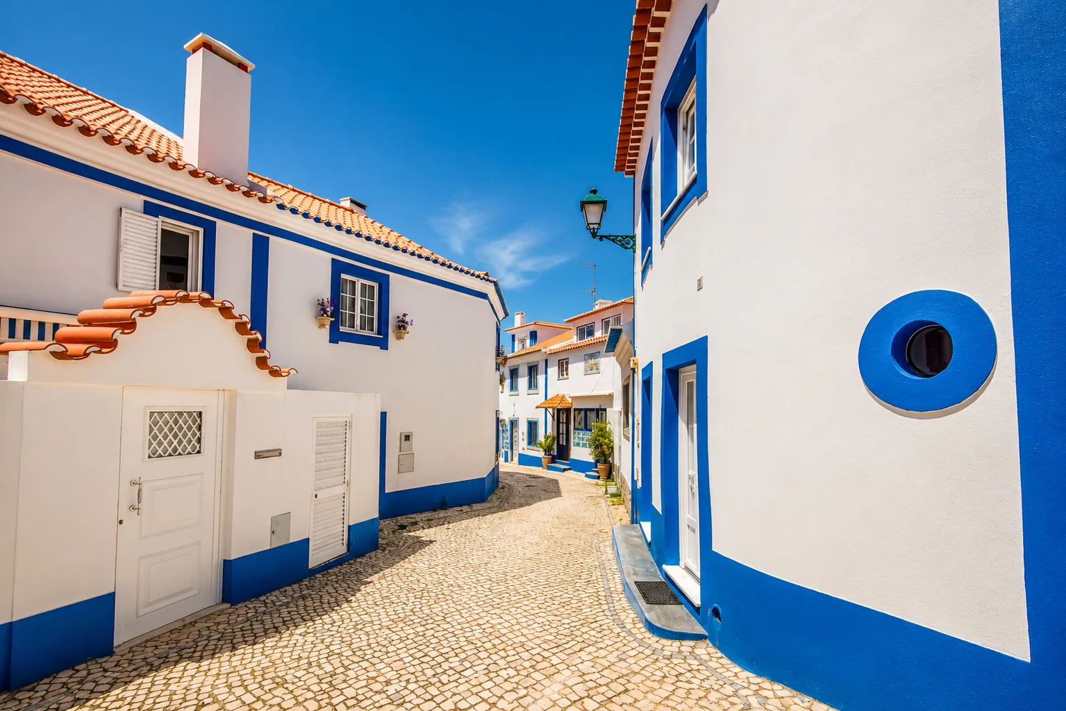 Whitewashed blue-trimmed houses of Ericeira